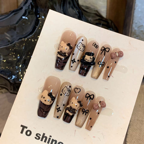 Hand-worn manicure ins premium brown Hello Kitty cat eye long white removable fake nail sticker m3331216