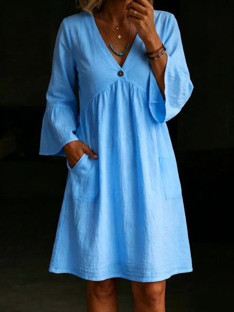 Elegant loose button V-neck solid color women's dress m302734